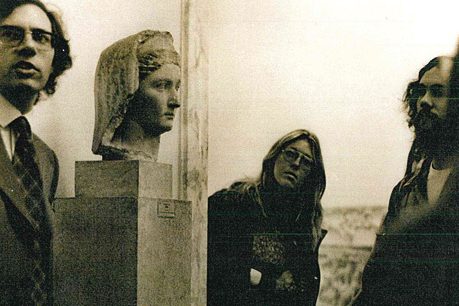 1974 – Ginny Greenland with John Reich discussing the past. Courtesy photo.