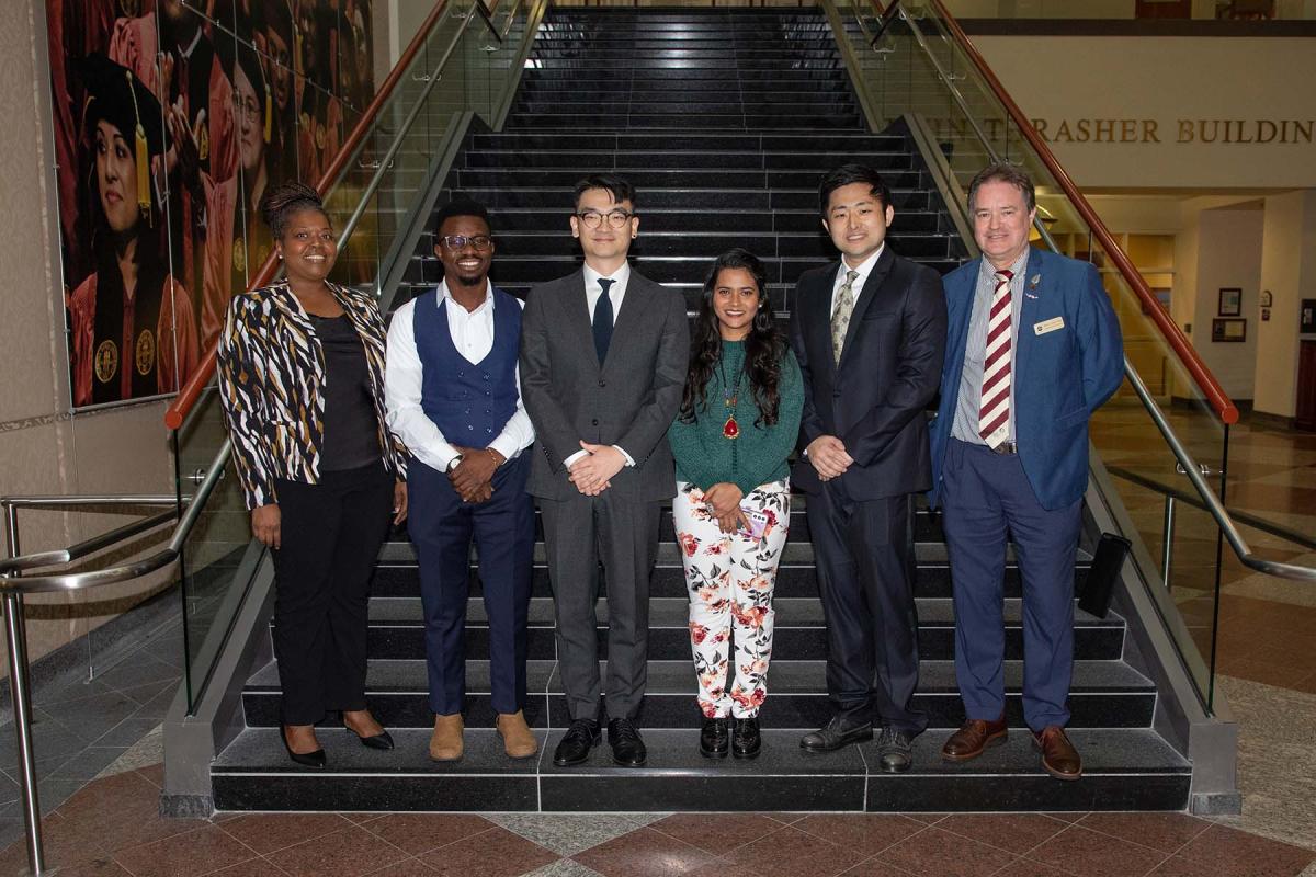 From L to R: Adrienne Stephenson, associate dean of The Graduate School; John Akintola, People’s Choice Award winner; Hyosoon Yim, first-place winner; Tania Sultana, second-place winner; Meng Tian, third-place winner; and Mark Riley, dean of the Graduate School. (FSU Photography Services)