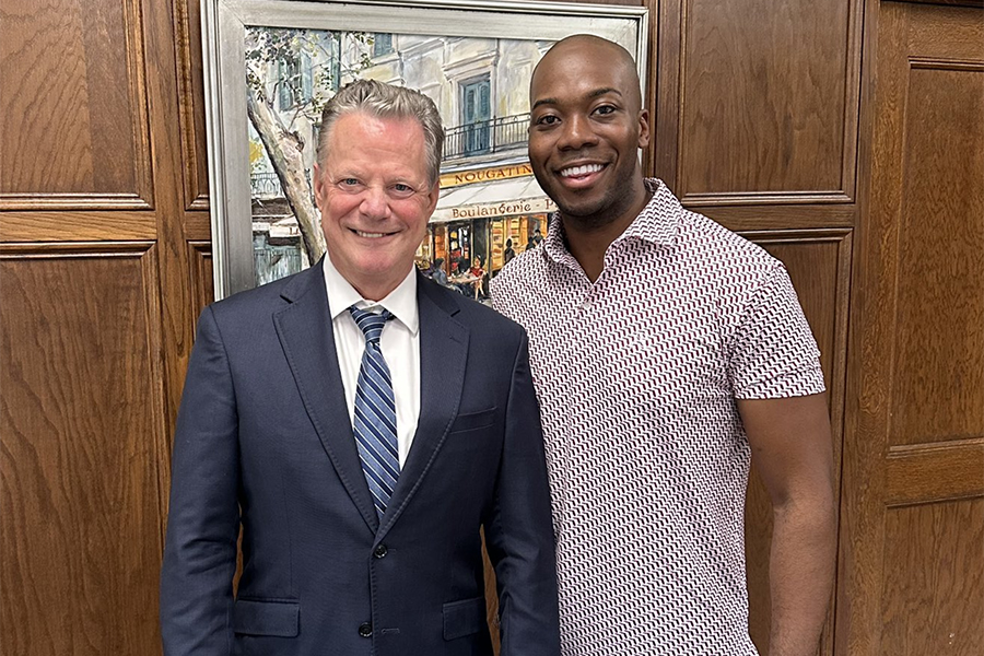 Tevin Wooten visits Dean Sam Huckaba during Homecoming Week.