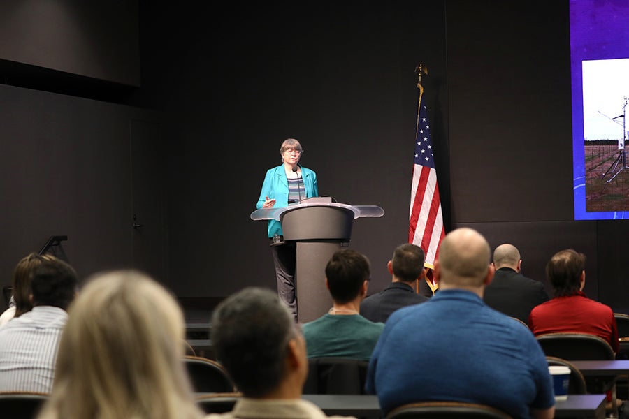 Pam Knox, director of the UGA Weather Network, presents at the conference.
