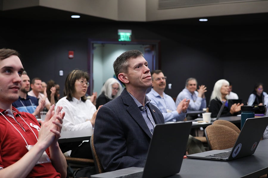 Participants attend the NOAA joint conference.