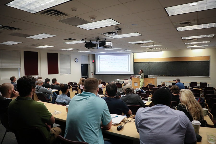 Participants attend the Second Joint Alabama-Florida Conference on Differential Equations, Dynamical Systems and Applications.