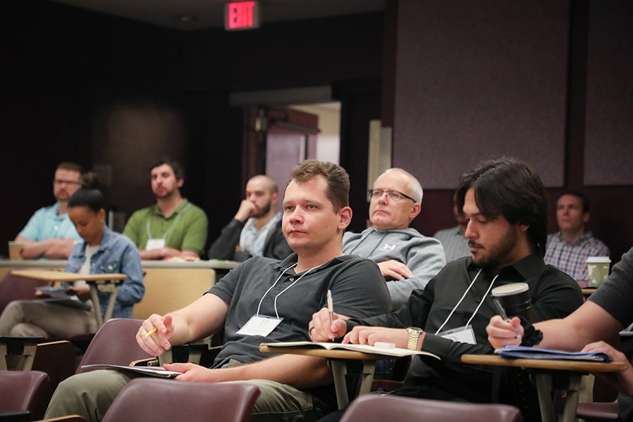 Participants attend the Second Joint Alabama-Florida Conference on Differential Equations, Dynamical Systems and Applications.