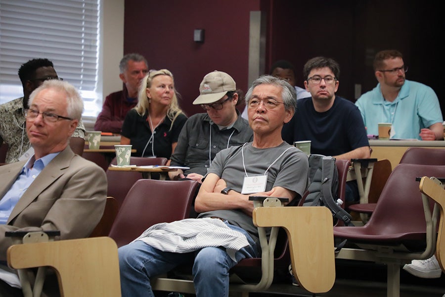 Participants attend the Second Joint Alabama-Florida Conference on Differential Equations, Dynamical Systems and Applications.