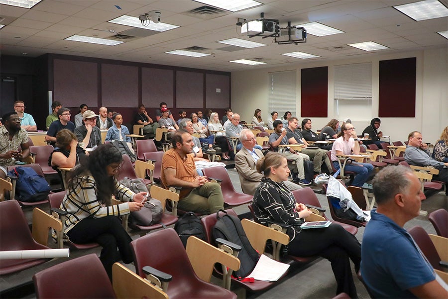 Participants attend the Second Joint Alabama-Florida Conference on Differential Equations, Dynamical Systems and Applications.
