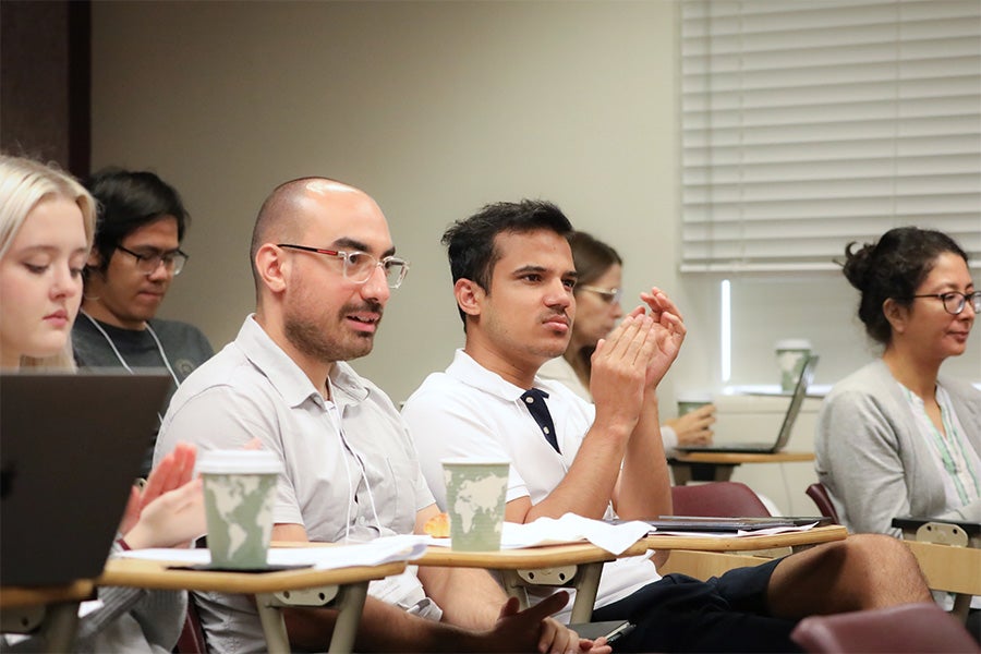 Participants attend the Second Joint Alabama-Florida Conference on Differential Equations, Dynamical Systems and Applications.