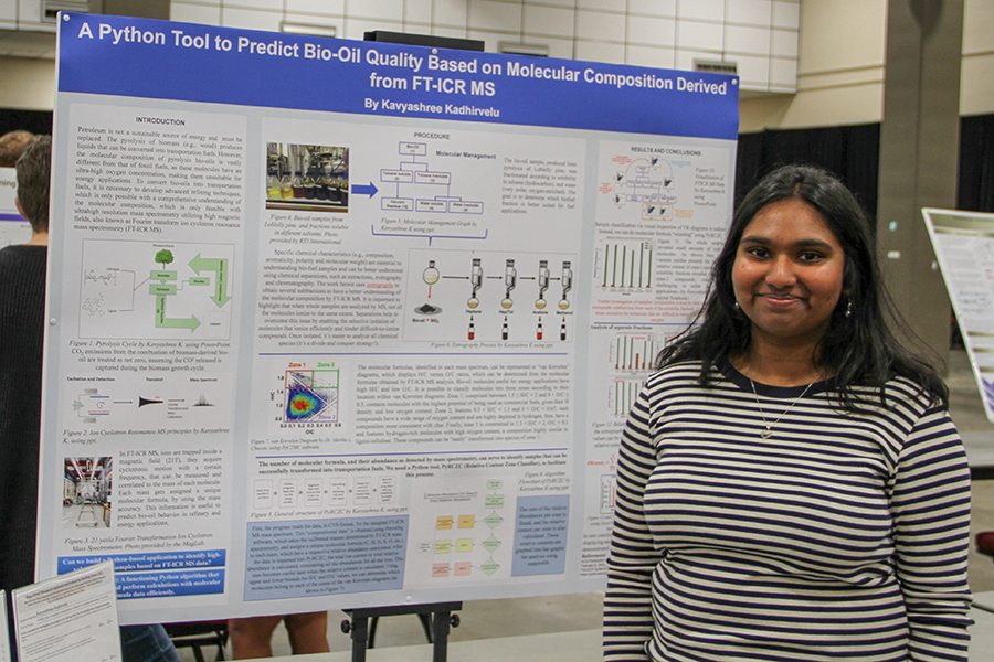 A student poses with their poster board at the 2023 Capital Regional Science Fair. Courtesy photo.