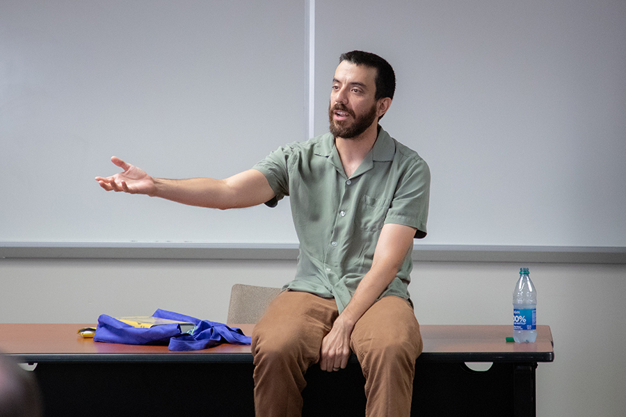 Kaveh Akbar speaks with English department students and faculty during an open-forum event Oct. 23.