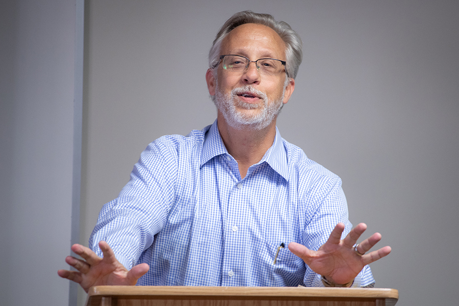 Professor of English James Kimbrell introduces poet Kaveh Akbar ahead of an open-forum event Oct. 23.