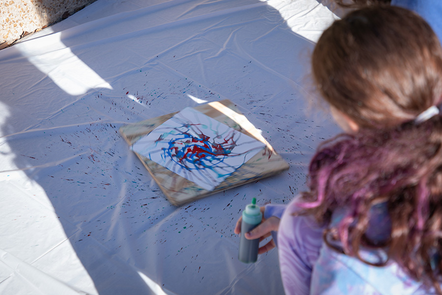 Physics meets arts as children and parents take part in the Saturday Morning Physics "Spin, Spin, Spin!" event on Oct. 12.