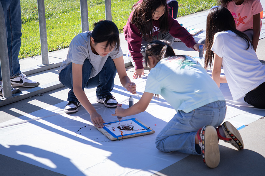 Physics meets arts as children and parents take part in the Saturday Morning Physics "Spin, Spin, Spin!" event on Oct. 12.