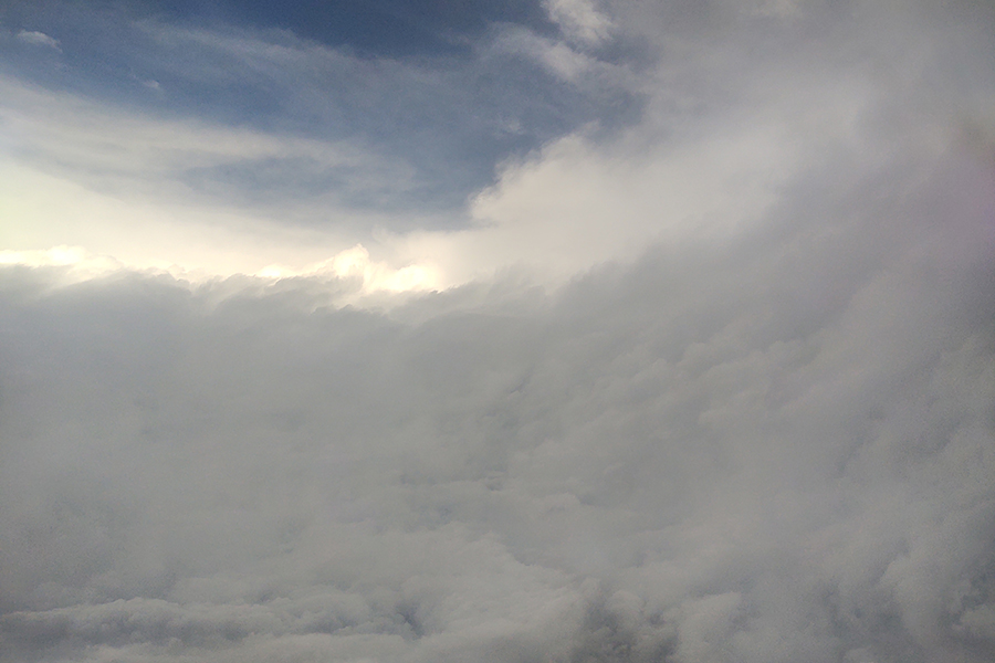 Cloud formations outside of the plane window seen before entry to a storm. Courtesy Andrew Hazelton.