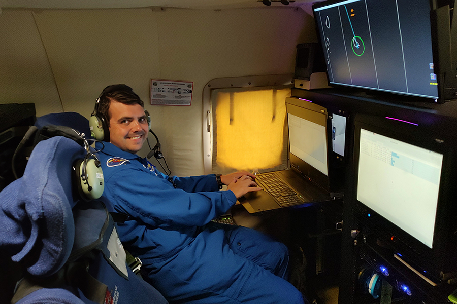 Andrew Hazleton conducting research on board an expedition into Hurricane Tammy in 2023. Courtesy Andrew Hazelton.