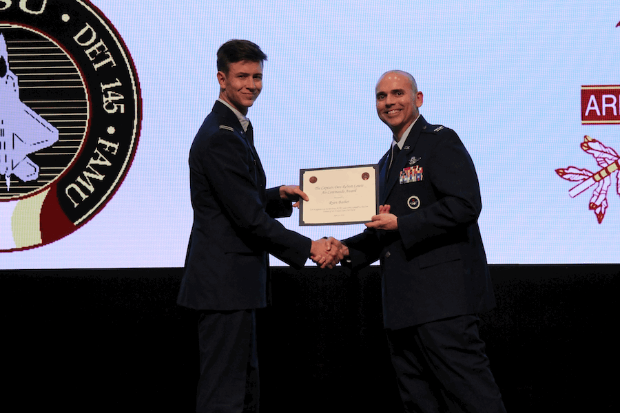 FSU senior Ryan Bachér receiving the Captain Don Robert Lewis Air Commando Award in recognition of Bachér’s reflection of core values of the U.S. Air Force. Photo courtesy Logan Craig.