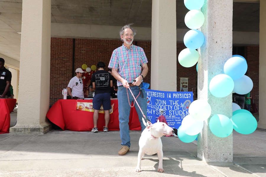 Attendees at the 2025 Circus of Physics had the chance to meet Phoebe the Physics Dog, the beloved companion of teaching laboratory specialist Mark Cartagine and official spokesdog of FSU's Department of Physics. Photo by Kendall Cooper.