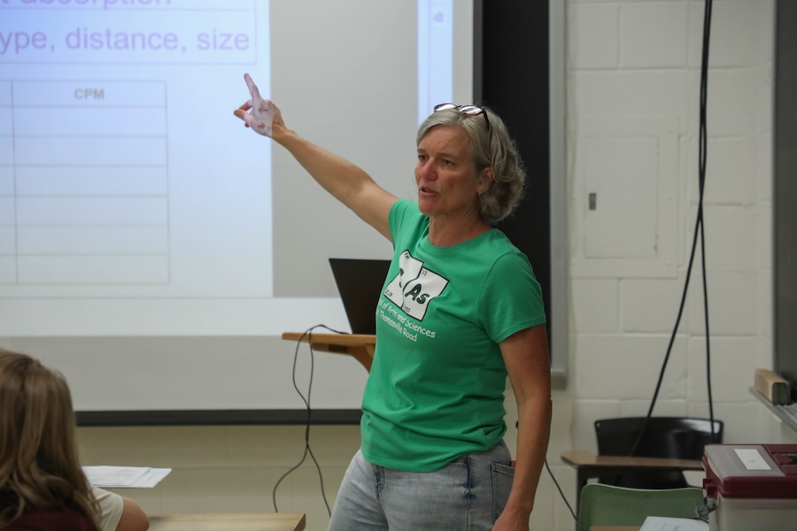 Julie Sear, a science teacher at the School of Arts and Sciences on Thomasville Road, answers questions during the Nuclear Medicine and Science Camp. Photo by Carly Nelson.