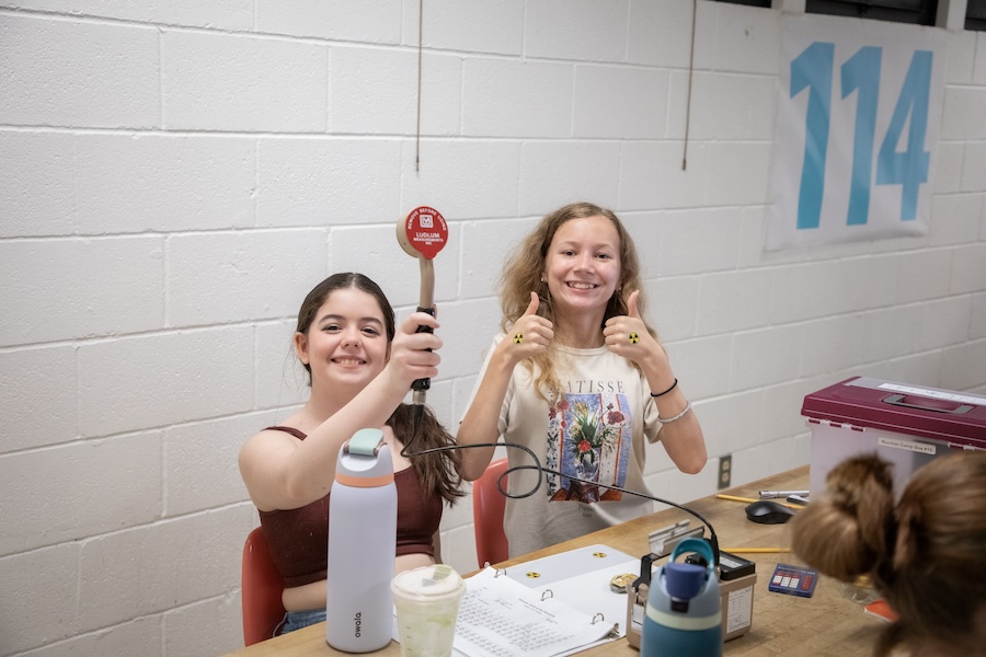 Middle school students use Geiger counters, a device for measuring the presence and frequency of radiation, to study how gamma rays are adsorbed in a variety of materials. Photo by Devin Bittner.