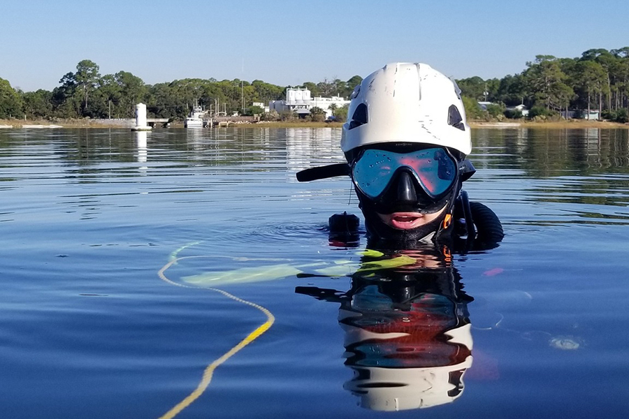 Academic Diving Program participant and graduate student Adin Domen practices diving at FSU's Coastal and Marine Laboratory. Photo by Chris Peters.