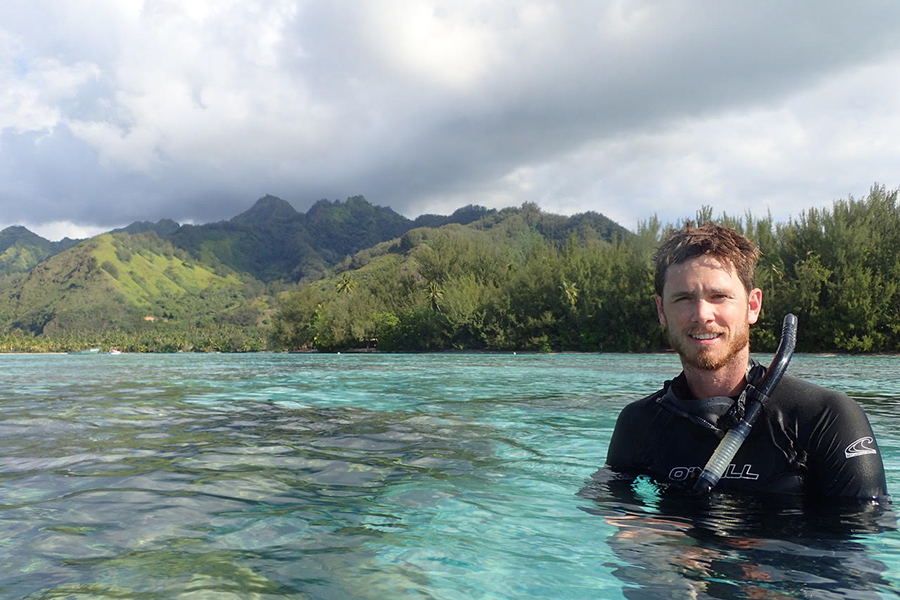  Diving Safety Officer Chris Peters stands near shore during a project in Moorea, French Polynesia. Photo by Scott Burgess.