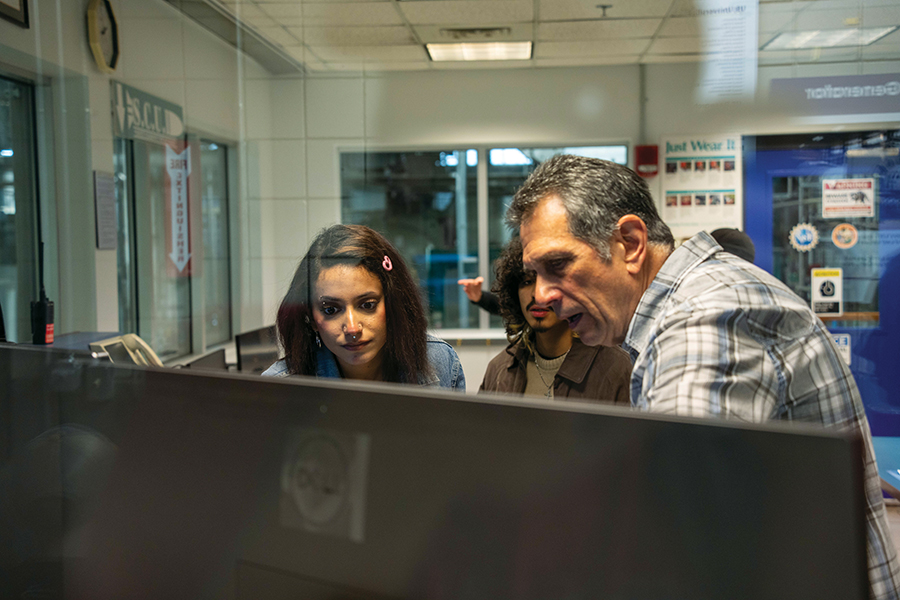 Researchers demonstrate tasks in the control room during the 2025 National High Magnetic Field Laboratory Open House. Photo by Stephen Bilenky.