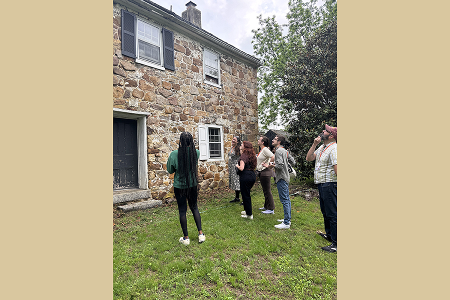 Conti discusses the intricate stone masonry work at the historic Poplar Hall outside of Newark, Delaware with her students Beauchamp, Camp, Cole, Evans and MacKinlay. Courtesy Photo.