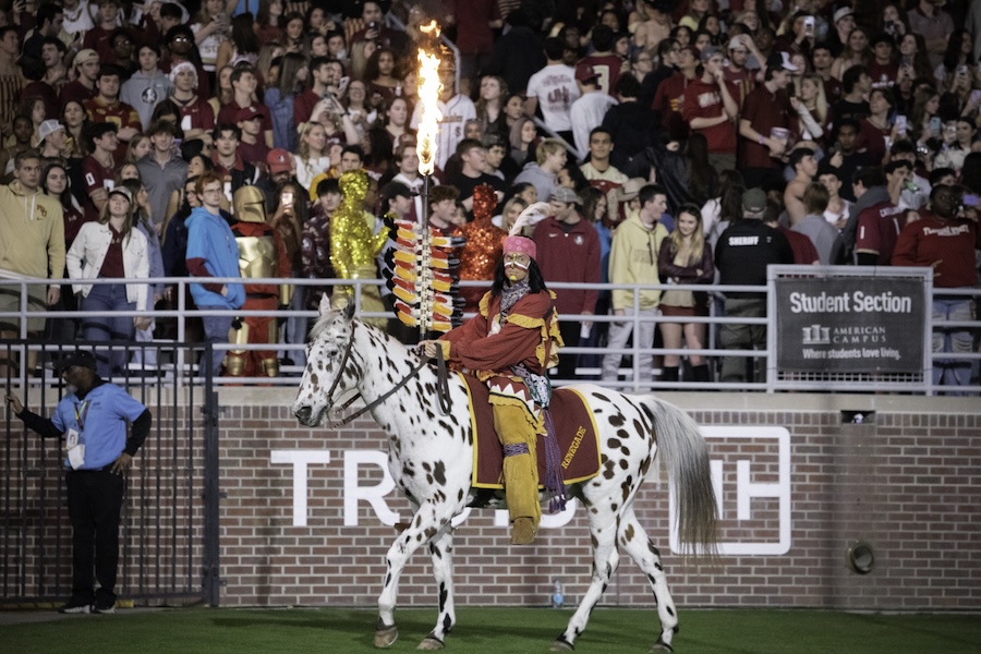 Osceola and Renegade prepare to take the field to plant the flaming spear at the 2025 Military Appreciation Game. Photo by Carly Nelson.