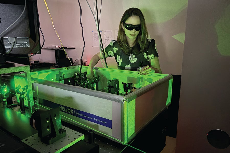 Alexandra Barth uses laser-based instruments to measure and characterize molecules. Photo by Sarah Arteta.