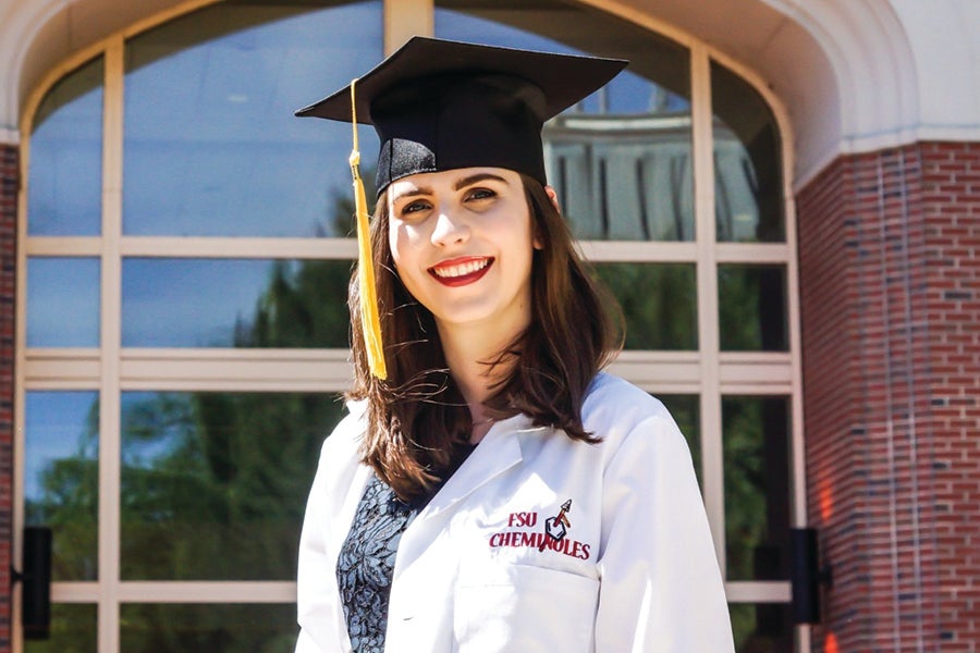Barth at graduation. Photo by Scotty Pham.