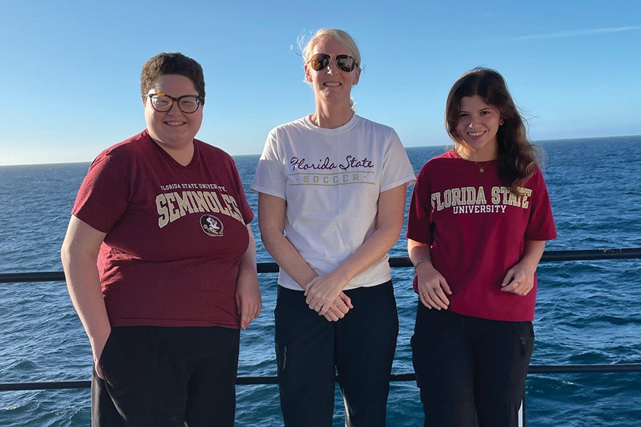 Graduate student Paige Payne, Olivia Mason, and graduate student Kaitlin Dombroski on the R/V Marcus G. Langseth off the coast of Namibia, Africa. Courtesy photo.