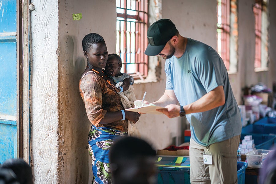 Tim Stutz conducts volunteer work with OneWorld Health. Photo courtesy Insight Global.