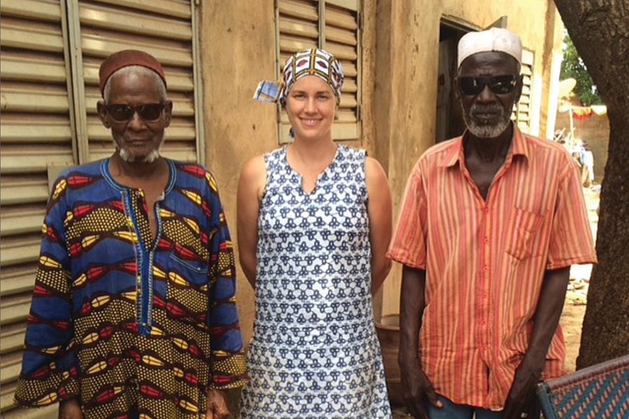Bell with Diallo (left) and Koniba Doumbia (right), a welder who works next door to Diallo.