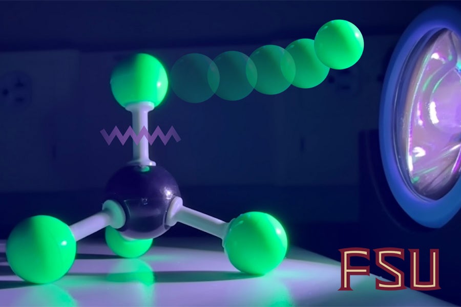 An illustration showing a bond breakage like those examined by FSU researchers in this study. This is an example of a tetrachloroferrate molecule (FeCl4-) being excited with a UV lamp, releasing a chlorine atom. (Courtesy of Rachel Weiss)