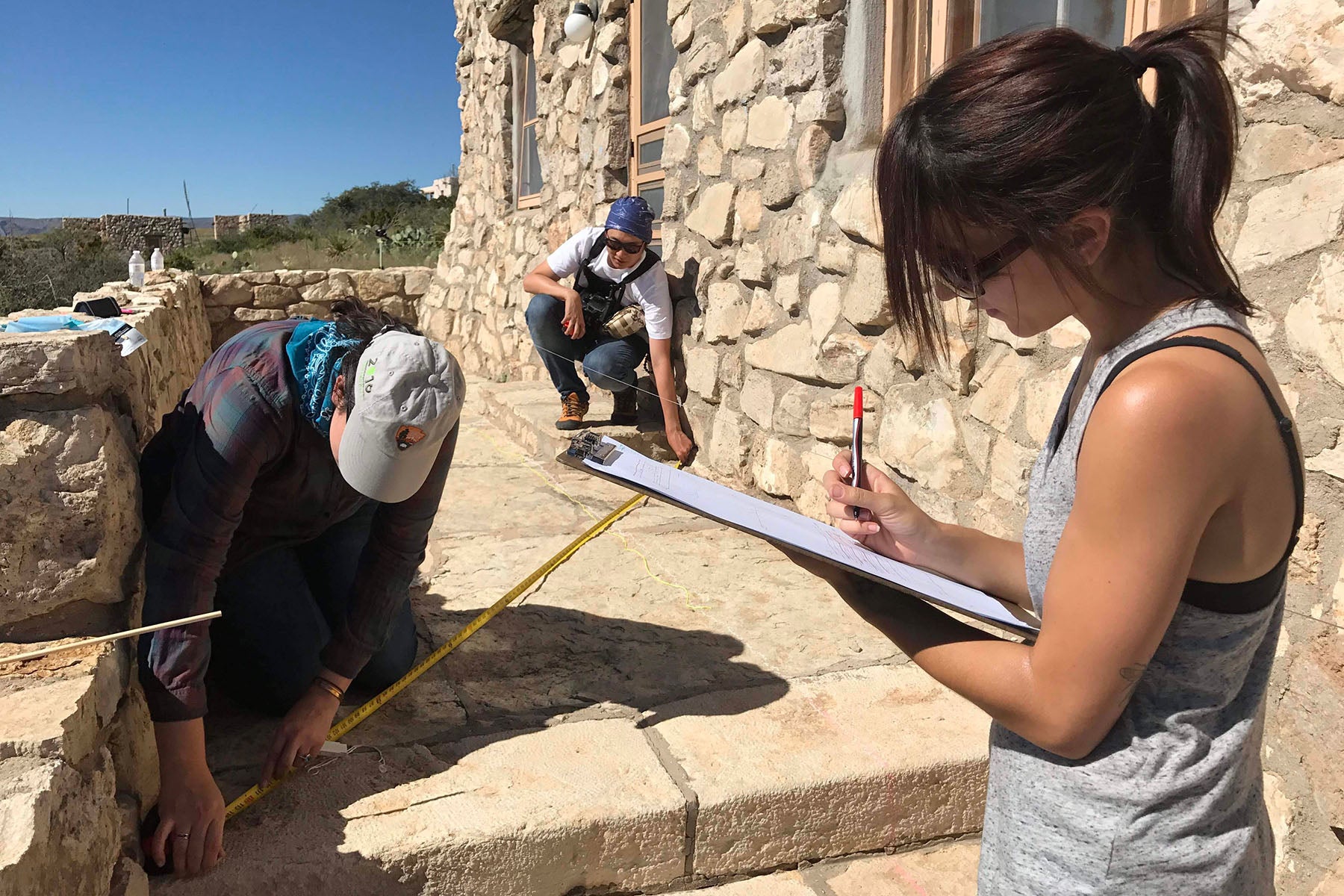 Kathleen Powers Conti and others document a historic building at Carlsbad Caverns National Park, New Mexico. (Kathleen Powers Conti)