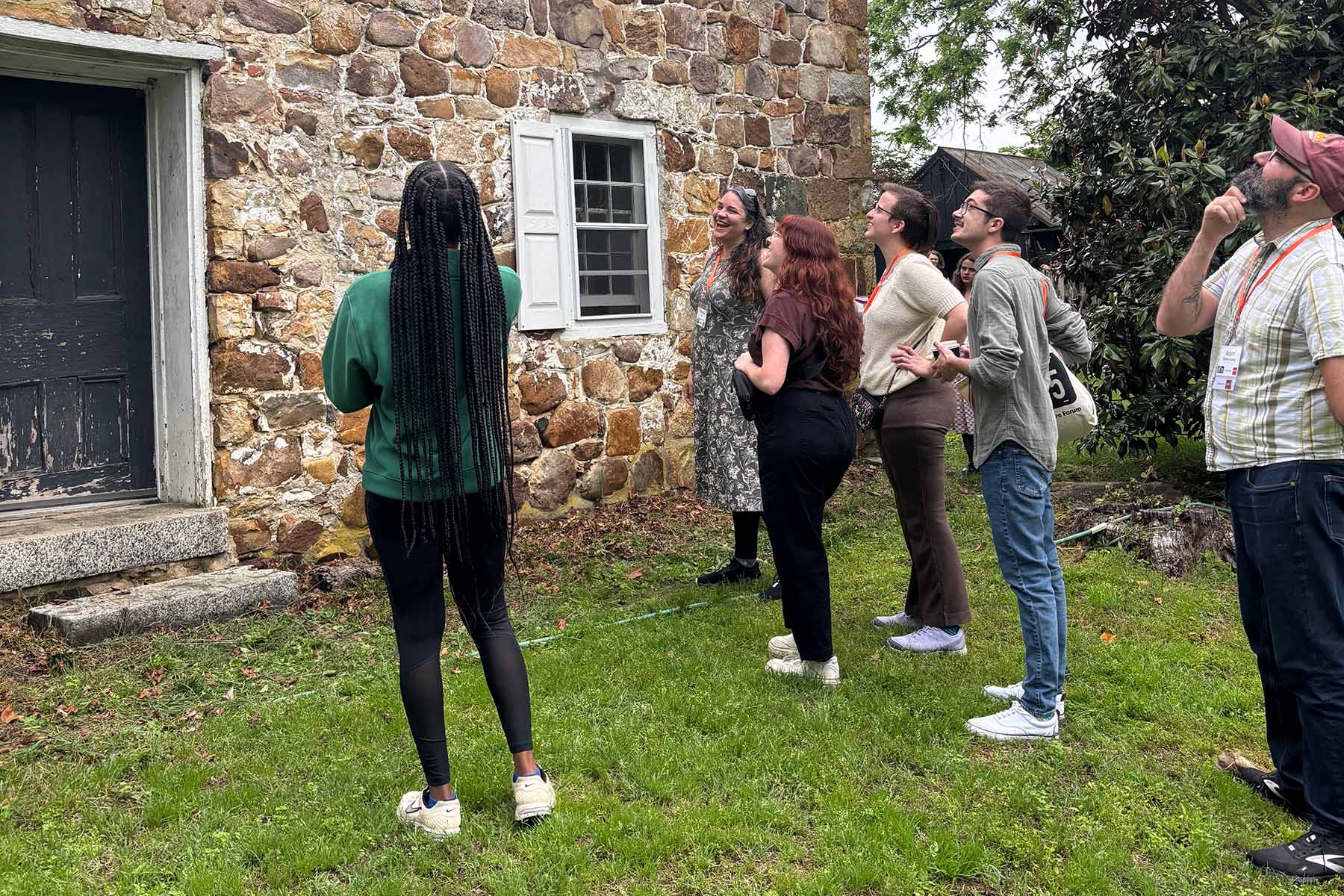 Kathleen Powers Conti discusses the intricate stone masonry work at the historic Poplar Hall outside of Newark, Delaware with her graduate students MiKayla Cole, Hope Evans, Gabrielle Camp, Aidan MacKinlay and Adam Beauchamp. (Kathleen Powers Conti)