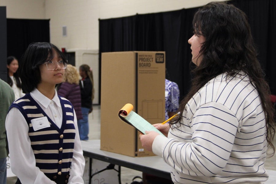 A student speaks with a judge at the 2026 Capital Regional Science and Engineering Fair Feb. 13 in Tallahassee, Florida. Photo by Éabha Phelan.