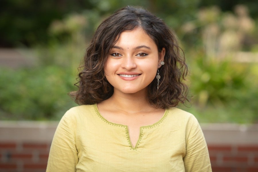 Headshot of Rimil Guha Roy. Photo by Devin Bittner.