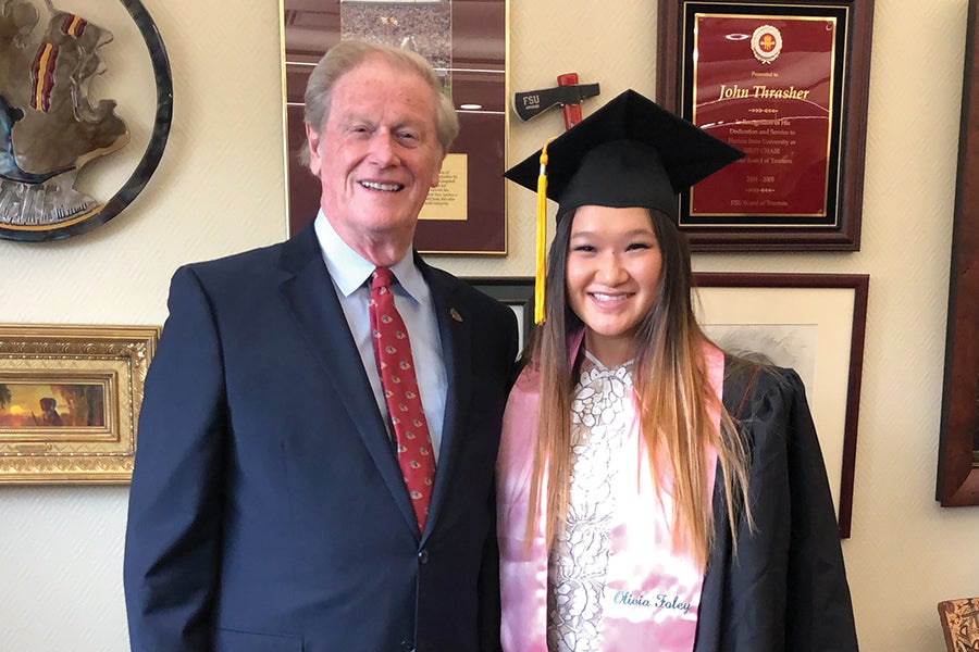 Foley on her undergraduate graduation day with then-President John Thrasher. Courtesy photo.