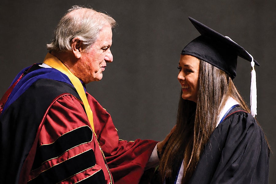 Meg Croney-Clark and then-President Thrasher