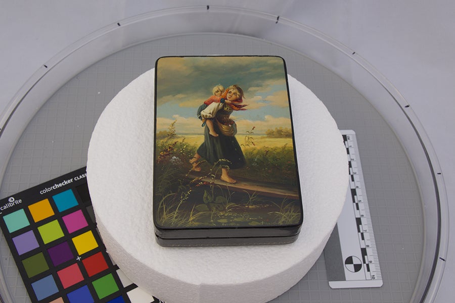 "Children Running from a Thunderstorm," unidentifiable artist, mid-late 20th century. Box, oil paint on papier-mâché, composition by Konstantin Makovsky. Photo by Sophie Works.