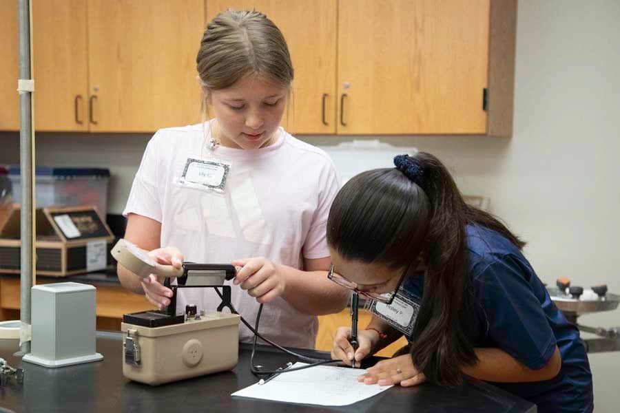 Middle school students use Geiger counters and take down notes during the 2026 Nuclear Medicine and Science Camp at Mosley High School in Lynn Haven, Florida. Photo by Carly Nelson.