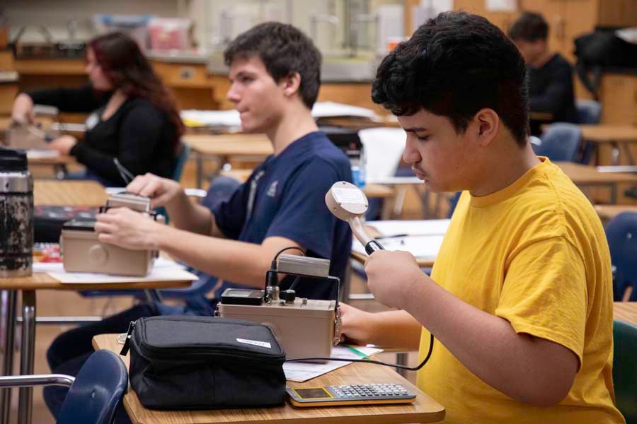 Middle school students use Geiger counters during the 2026 Nuclear Medicine and Science Camp at Mosley High School in Lynn Haven, Florida. Photo by Carly Nelson.