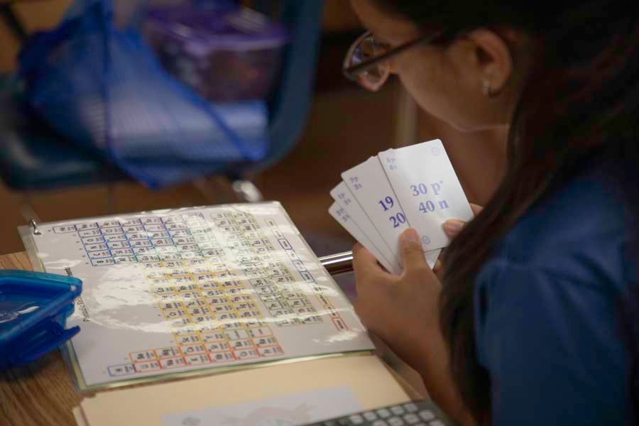 Middle school students play with special physics cards during the 2026 Nuclear Medicine and Science Camp at Mosley High School in Lynn Haven, Florida. Photo by Carly Nelson.