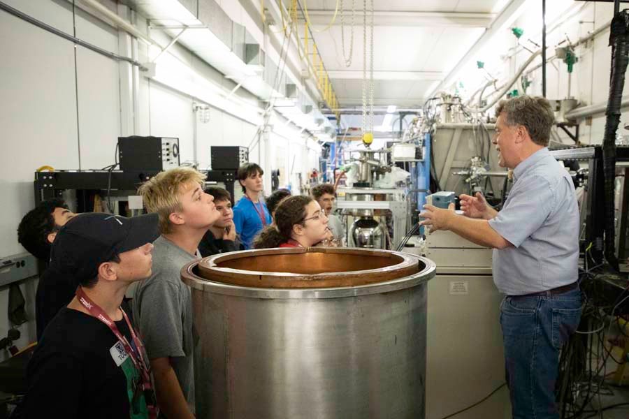 Professor Ingo Wiedenhoever leads students on a tour of the John D. Fox Superconducting Linear Accelerator Laboratory at Florida State University as part of the 2026 Nuclear Medicine and Science Camp. Photo by Carly Nelson.