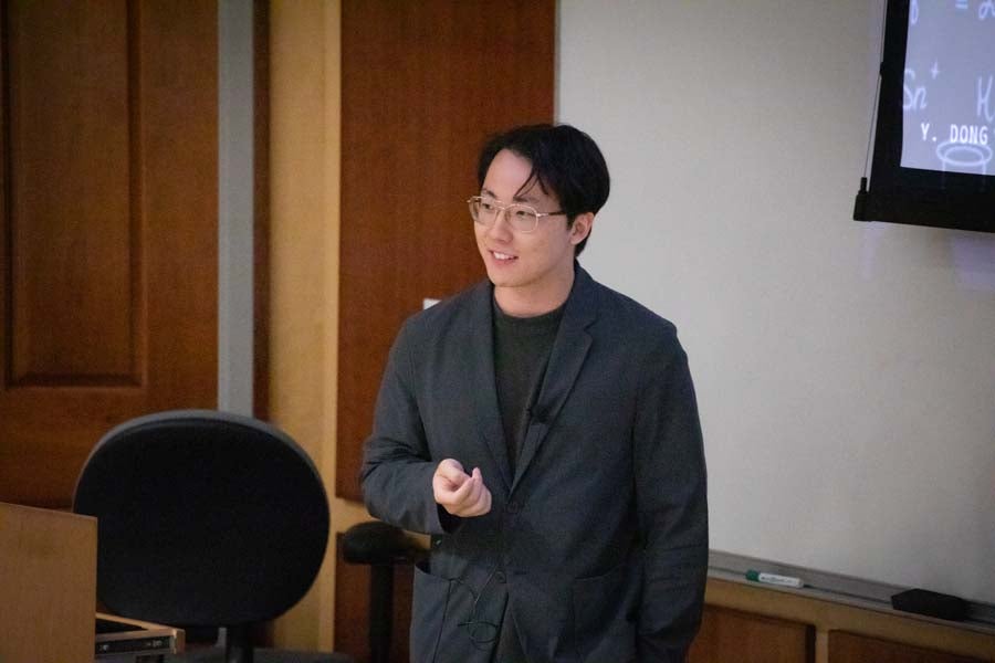Department of Computer Science Assistant Professor Yushun Dong addresses attendees during the 2026 AI Bootcamp at the Kroto Auditorium on Aug. 19, 2026. Photo by Devin Bittner.