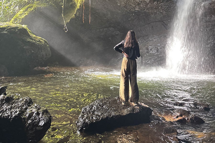 Amelia Rivers, a recent graduate of the College of Music, visiting “La Cueva del Esplendor,” a waterfall located outside of Jardín, Colombia