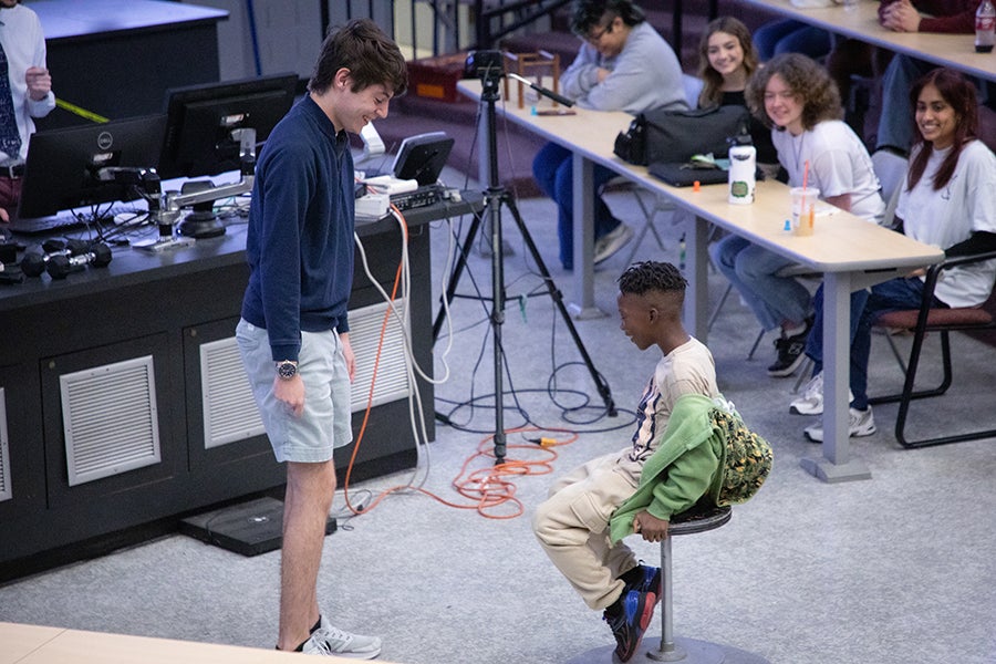 Two students participate in a demonstration as part of a Saturday Morning Physics event hosted by the Society of Physics Students at Florida State University on Oct. 11, 2025. Photo by Carly Nelson.