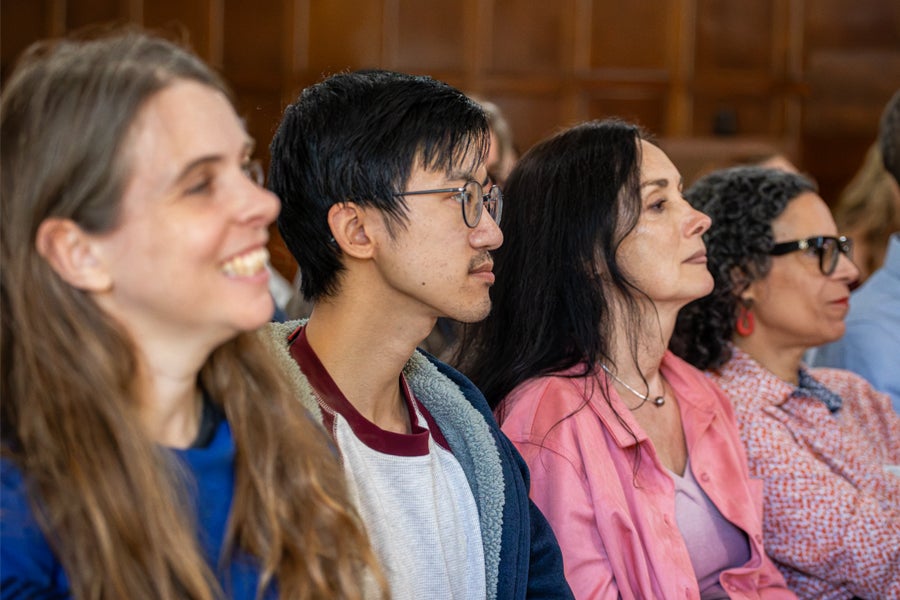 Audience listens