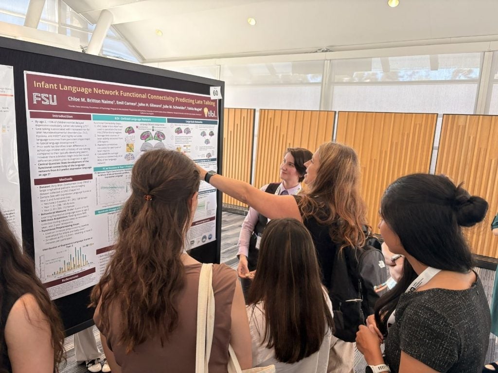 Chloe Britton Naime presents research.