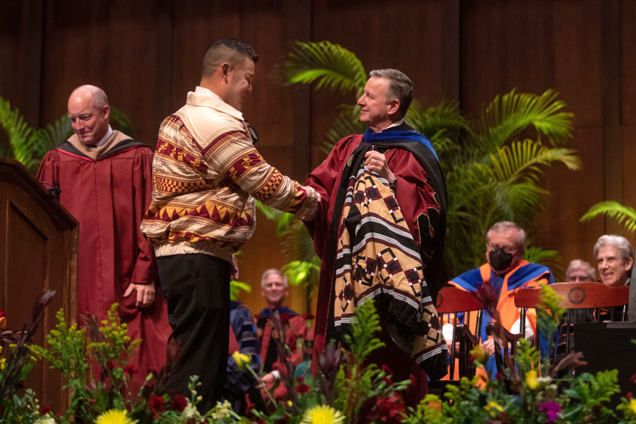 McCullough accepts a gift from the Seminole Tribe of Florida during his February 2022 investiture ceremony.