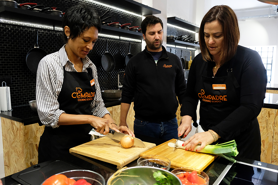 Trying out a cooking workshop for clients. Courtesy photo.